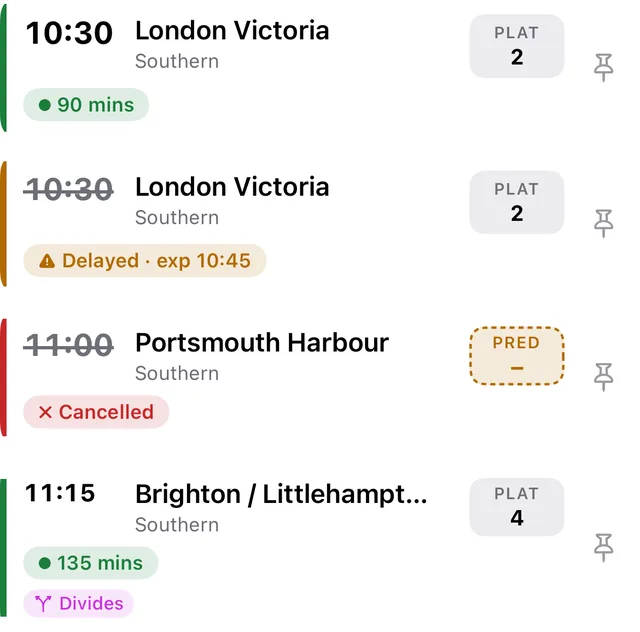 Departure rows showing a confirmed platform, a dashed predicted platform, a red changed platform and a dividing train